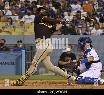 Los Angeles, United States. 12th Sep, 2021. San Diego Padres' Fernando Tatis Jr. hits a two-run home run in the fourth inning off Los Angeles Dodgers' starting pitcher Walker Buehler to tie the game 2-2 at Dodger Stadium in Los Angeles on Saturday, September 11, 2021. Photo by Jim Ruymen/UPI Credit: UPI/Alamy Live News Stock Photo