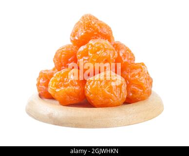 Dried apricot plum fruits(Preserved fruits or dried honey Chinese plum) on white background Stock Photo