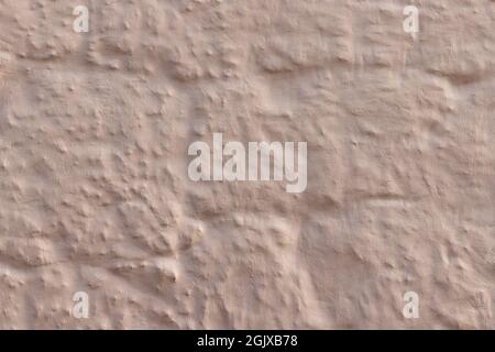 Texture of old wall covered with taupe plaster Stock Photo