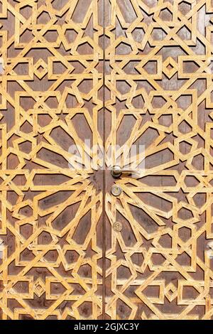 Double old wooden door with decorative pattern Stock Photo