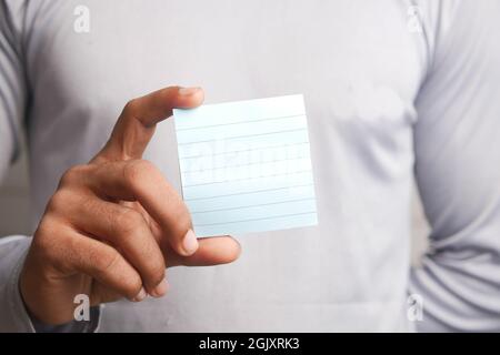 man hand hold a sticky notes close up  Stock Photo