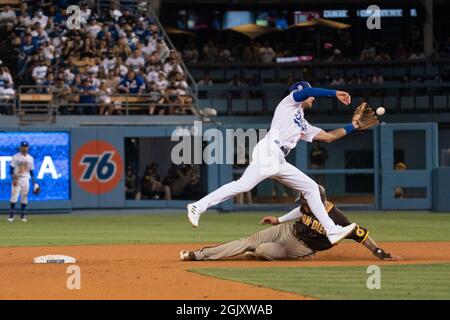 Milwaukee, WI, USA. 20th July, 2018. Los Angeles Dodgers shortstop Manny  Machado #8 is all smiles as he joins his new team just after the All-Star  break. Machado is seen here during