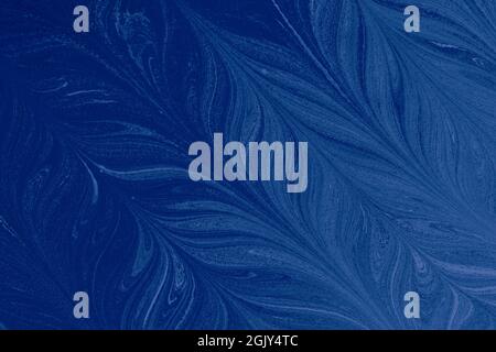 an abstract illustration of feather-shaped oily blue painting Stock Photo