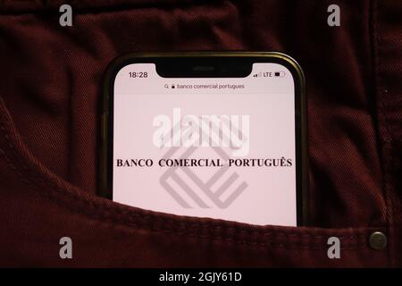 KONSKIE, POLAND - September 04, 2021: Banco Comercial Portugues BCP logo displayed on mobile phone hidden in jeans pocket Stock Photo