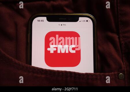 KONSKIE, POLAND - September 04, 2021: FMC Corporation logo displayed on mobile phone hidden in jeans pocket Stock Photo