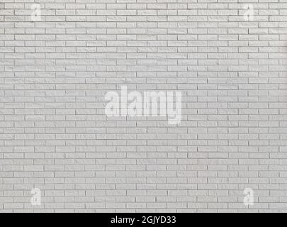 White new brick wall viewed from the front. High resolution full frame textured background. Copy space. Stock Photo
