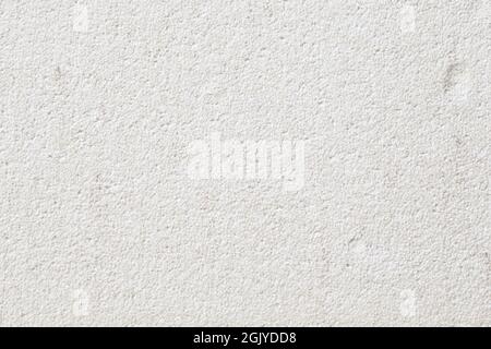 White foamed (or cellular or expanded) plastic polystyrene surface. Abstract high resolution full frame textured background. Copy space. Stock Photo