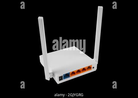 Wireless Wi-Fi router isolated on black background. wifi technology concept. White wireless internet router isolated. Cable modem with antenna isolate Stock Photo