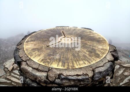 Triangulation point at the summit of Snowdon, Snowdonia National Park, Wales, UK Stock Photo