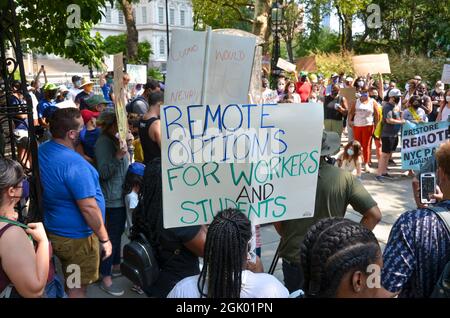 Concerned NYC municipal employees and school students gathered at City Hall Park to demand the restoration of remote work & school for all students. Stock Photo