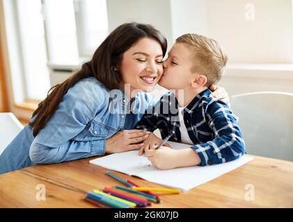 homework teaching boy portrait education mother children son familiy childhood Stock Photo