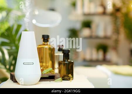 aroma lamp and essential oils in modern beauty studio. Stock Photo
