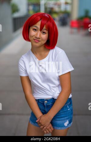 Red Blood Cell Cosplay Actress Standing on Sidewalk | Asian Cosplay Actress