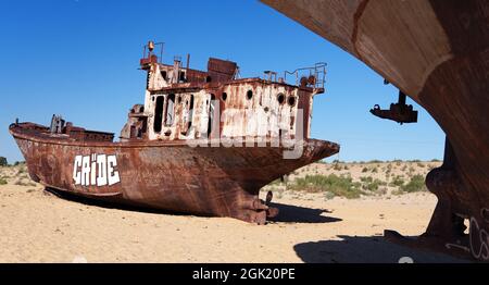 Boats in desert around Moynaq, Muynak or Moynoq - Aral sea or Aral lake - Uzbekistan - asia Stock Photo