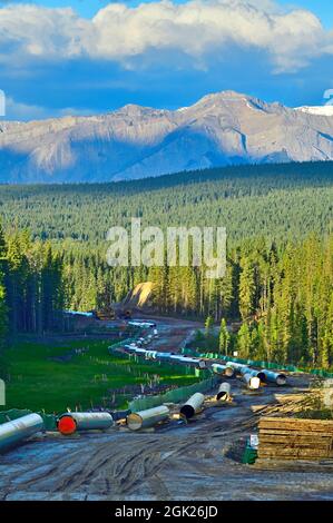 Construction of the Trans Mountain oil pipeline through thr rocky mountains near Hinton Alberta Canada Stock Photo