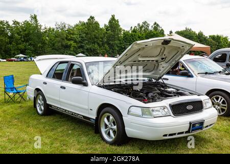 A white Ford Crown Victoria Police Interceptor sedan on display at a car show in Fort Wayne, Indiana, USA. Stock Photo