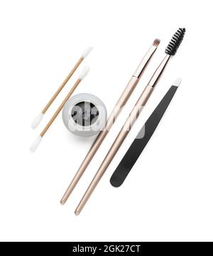 Henna and tools for eyebrows correction on white background Stock Photo