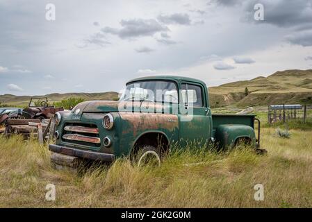 Ravenscrag, SK- August 21, 2021:  Abandoned vintage green Fargo pickup truck on the Saskatchewan prairies Stock Photo