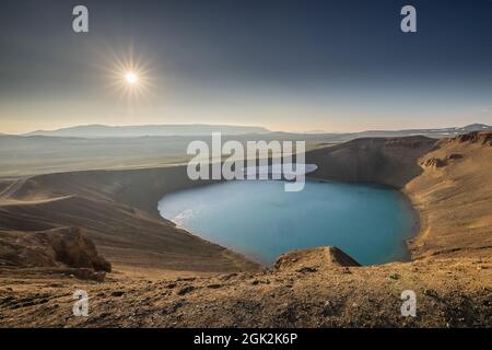 Viti crater in Krafla area of Iceland viewed from one of the outlook posts, on a nice summer evening, with sun slowly setting down. Stock Photo