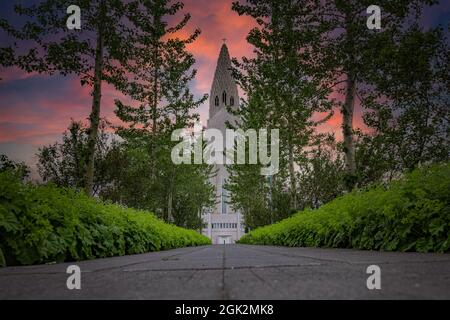 Hallgrimskirkja, a luteran church in the middle of Reykjavik, capital of Iceland, seen from back on a cloudy summer day. Stock Photo