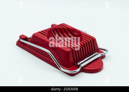 Egg slicer tool isolated on white background Stock Photo