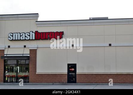 Humble, Texas USA 08-14-2019: Smashburger storefront in Humble, TX. Established in 2007 in Denver, Colorado. Stock Photo