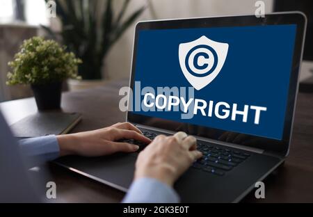 Copyright icon on screen. Patent Law and Intellectual Property. Business, Internet and Technology Concept. Stock Photo