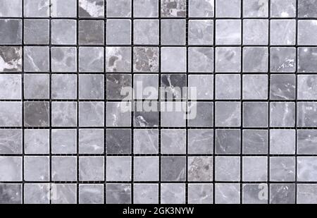 Gray marble mosaic tiles for kitchen and bathroom decor. Stock Photo