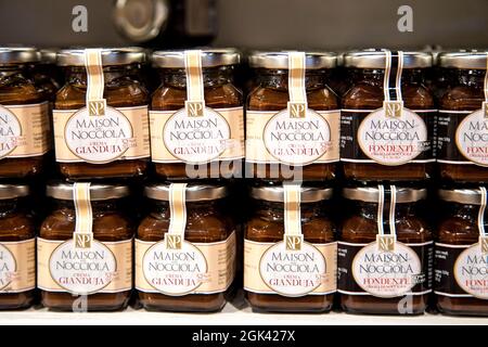 Chocolate hazelnut gianduja spreads in jar on a shelf at Eataly Italian food hall, Liverpool Street, London, UK Stock Photo