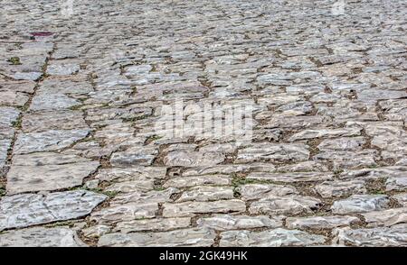 old stone road. Stone road texture. Selctive focus Stock Photo