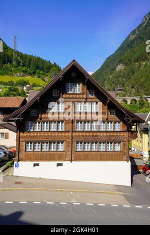 Traditional house in alpine village Wassen, Upper Reuss valley (Oberes Reusstal), of the canton of Uri in Switzerland. Stock Photo
