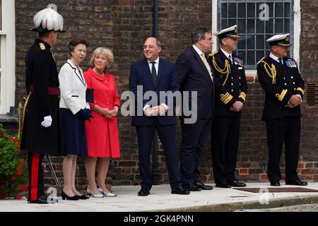 Defence Secretary Ben Wallace (centre) speaks to The Princess Royal (second left) and Constable Nicholas Houghton (left) as they attend the ceremony of the Constable's Dues at the Tower of London, where the Royal Navy crew from HMS Albion present a barrel of wine to the Constable of the Tower. Picture date: Monday September 13, 2021. Stock Photo