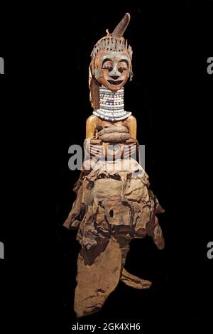 Congolese wooden Nkishi power figure of the Songye people of Republic of the Congo.The statue embodies the power of a Songye chief and mediated with the invisible spirit world.Late 19th-early 20th century Stock Photo