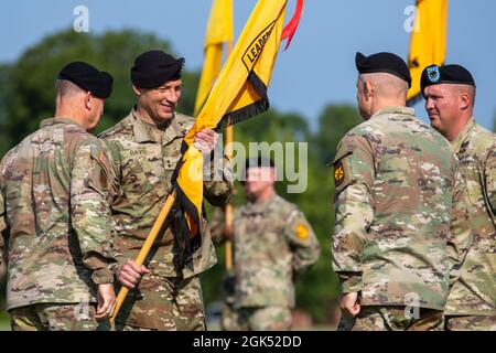 Maj. Gen. Johnny K. Davis receives the U.S. Army Cadet Command colors symbolizing the transfer of authority from outgoing Commanding General, Maj. Gen. John R. Evans Jr., Fort Knox, Ky., Aug. 3, 2021. Stock Photo