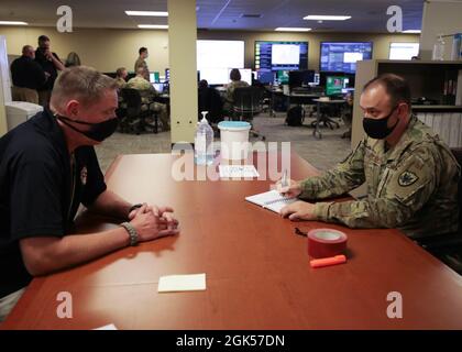 A member in support of Joint Task Force-Red Hill (JTF-RH) secures a ...