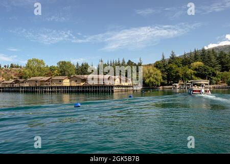 boat with tourists sail to Museum on water on Lake Ohrid Stock Photo