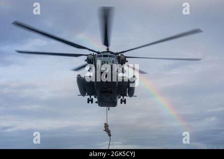 U.S. Marine fast-ropes from a tower aboard Marine Corps Base Hawaii ...