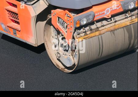 road roller machine compact fresh asphalt Stock Photo