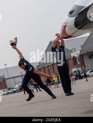 United States Air Force Air Demonstration Squadron, Thunderbirds, perform for the Thunder Over Michigan Air Show Aug. 8, 2021, in Ypsilanti, Michigan. During the recovery sequence, crew chiefs will place chocks around the tires to keep the aircraft from moving. Stock Photo