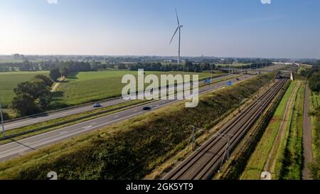 Motorway with few cars and railroad next to it, near the exit of Brecht in Belgium, Europe. High quality photo Stock Photo