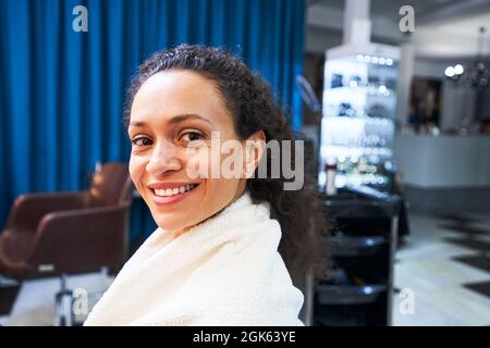 Portrait of happy brunette posing on camera Stock Photo
