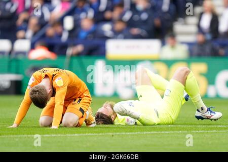 Hull’s Keane Lewis-Potter clashes with Preston goalkeeper Declan Rudd leading to the keeper leaving the field  Picture by Steve Flynn/AHPIX.com, Footb Stock Photo