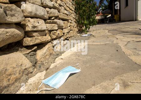A discarded facemask during the Covid-19 pandemic in a remote village in Cyprus Stock Photo
