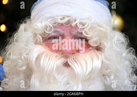 The face of the Russian Santa Claus in a hat with a beard. Stock Photo