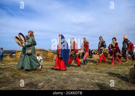 ZAPORIZHZHIA REGION, UKRAINE - SEPTEMBER 11, 2021 - History enthusiasts are pictured during the Legends of Steppe 2021 Open Folk Festival on Mount Oba Stock Photo