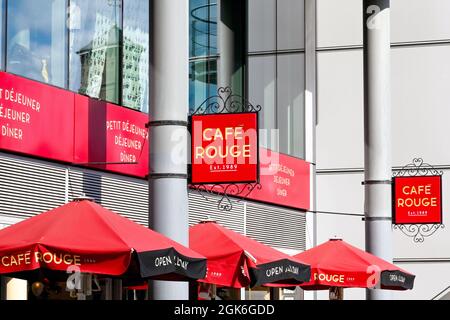 London, England - August 2021: Sign on the outside of a branch of the Cafe Rouge restaurant chain. It is owned by the Casual Dining Group Stock Photo