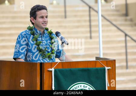 210817-N-XG173-1103   HONOLULU (Aug. 17, 2021) - Brian Schatz, Hawaii's senior U.S. senator, gives a speech during the Naval Reserve Officers' Training Corps (NROTC) commissioning ceremony at the University of Hawaii Manoa. This is the first cohort of the NROTC at the University of Hawaii Manoa. The NROTC program provides new opportunities to college students who are seeking to further their own educational career while also making a difference and serving their country. Stock Photo