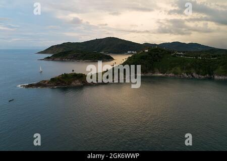 Aerial view drone shot of laem promthep cape Beautiful scenery andaman sea in summer season Amazing sunset twilight over sea Phuket thailand. Stock Photo