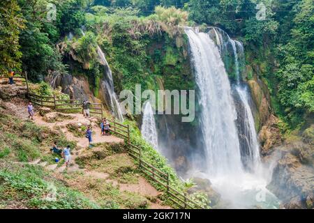 PULHAPANZAK, HONDURAS - APRIL 18, 2016 Tourists observe Pulhapanzak waterfall Stock Photo