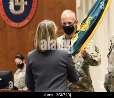 Col. Gregory K. Gibbons accepts the Army Logistics University colors during a change of commandant ceremony Aug. 19 in Bunker Hall’s Green Auditorium. ALU President Sydney A. Smith presided over the formalities. Gibbons previously served as the 50th commander of Letterkenny Army Depot, Chambersburg, Pennsylvania. Stock Photo